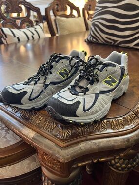 New Balance ( running mens shoes )
 ( All Terrain ) casual / Athletic shoes